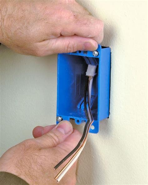 blue electrical box for drywall installation|installing electrical boxes on drywall.